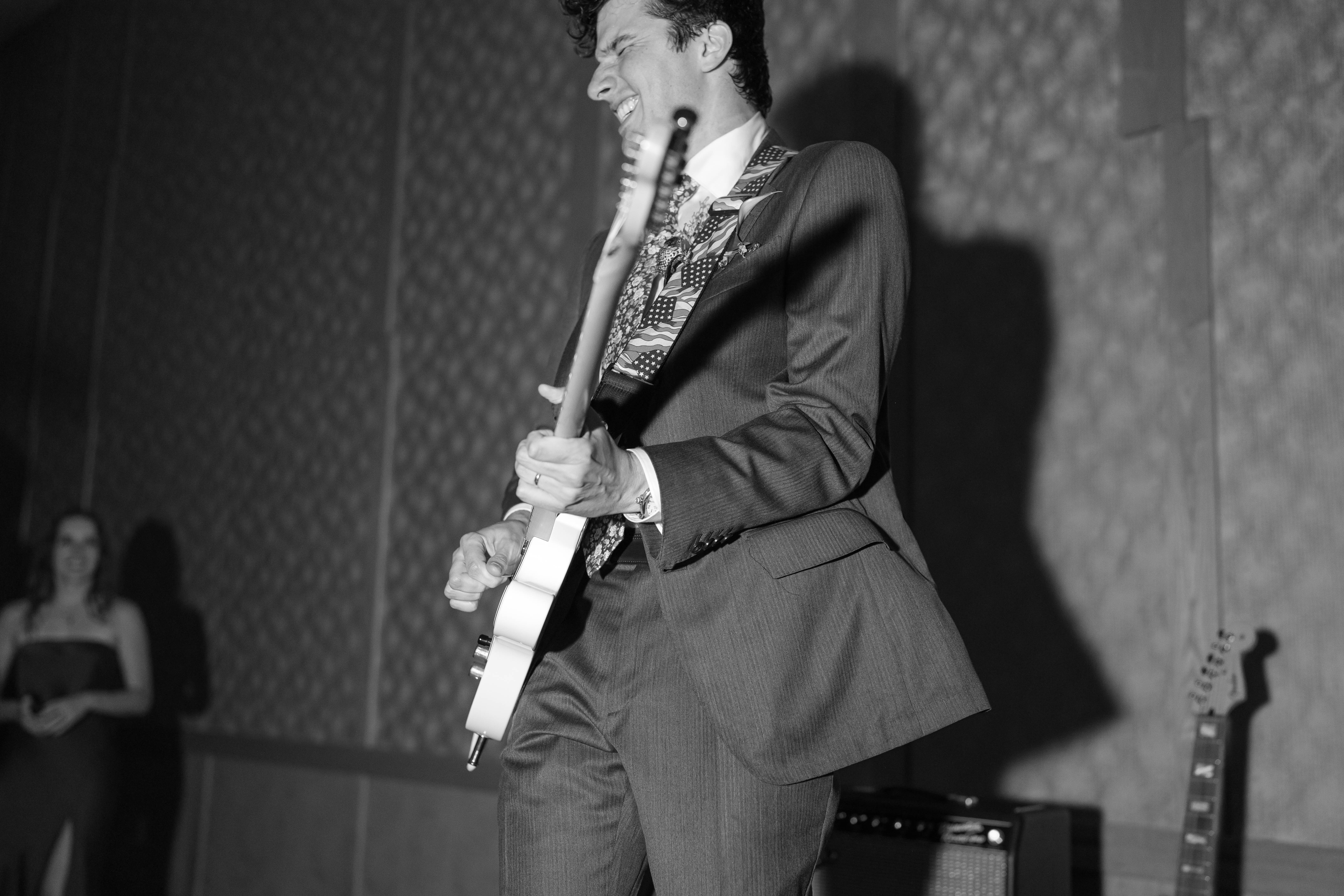 David playing "Isn&rsquo;t She Lovely" at his wedding reception